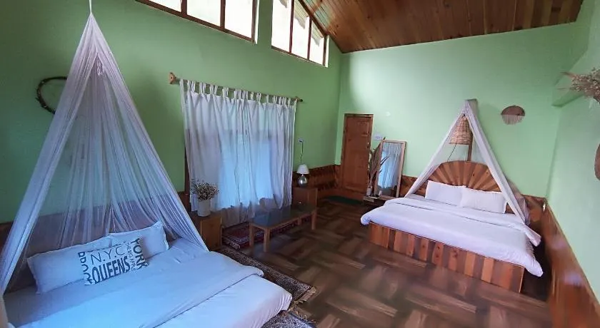 BohOdyssey Hallan a Traditional Village Stay with Panoramic Mountain Views - Image 1