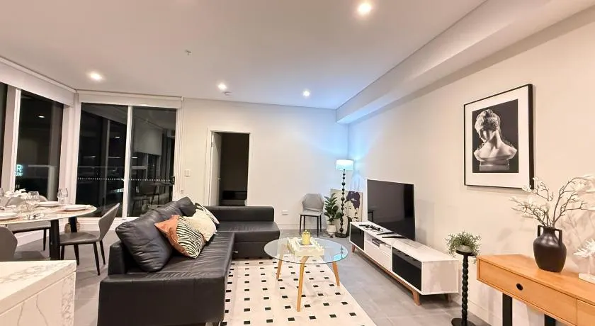 Olympic Park Escape 2BR w Gym, Pool & Free Parking - Image 1