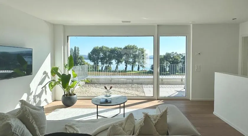 Stylisches Ferienhaus bis 6 Gäste mit einzigartigem Seepanorama - Image 1