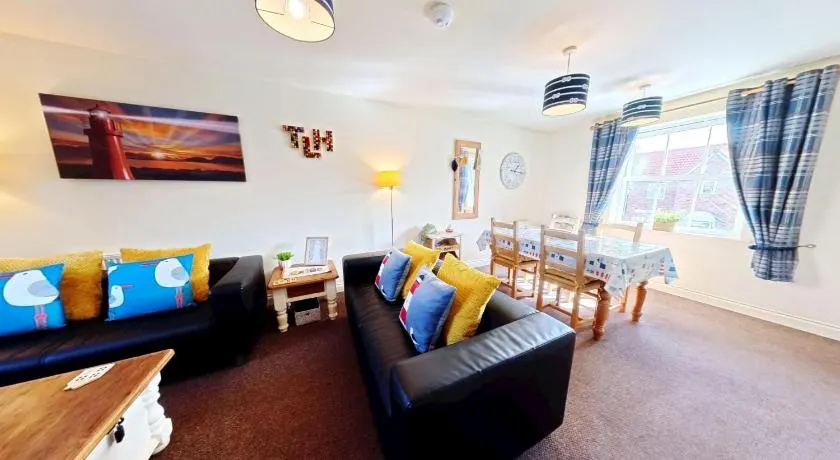Lighthouse Apartment - Part of the The Bay Filey Holiday Village with pool, gym and direct beach access, pub, restaurant, tennis and meadows walks - Image 1