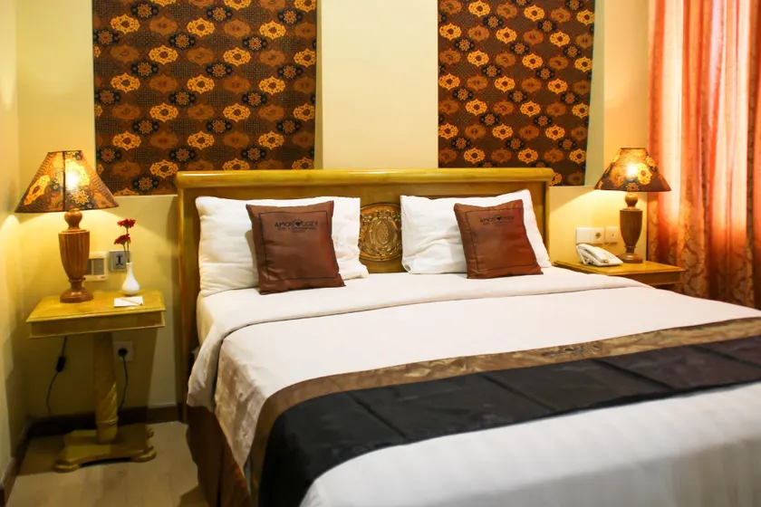 Amos Cozy Hotel Melawai - Image 1