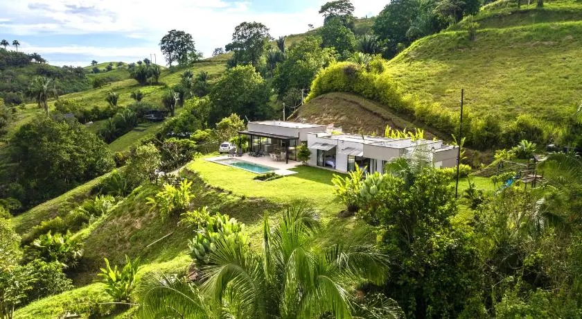 Modern Villa Surrounded by Nature and Gardens with Pool and Stunning Mountain and River Views - Image 1