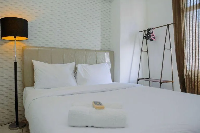 Spacious 2BR Green Bay Pluit Apartment By Travelio - Image 1