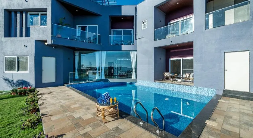 SaffronStays Blueberry - 4BR Panchgani villa with pool, bar lounge & terrace, lush garden vibes for family celebrations - Image 1