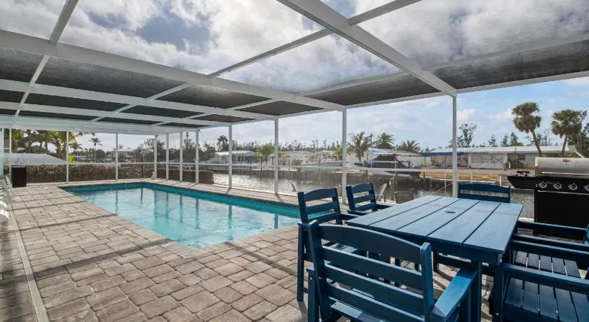 Canalfront Bradenton home with Dock & Heated Screened In Pool - Image 1