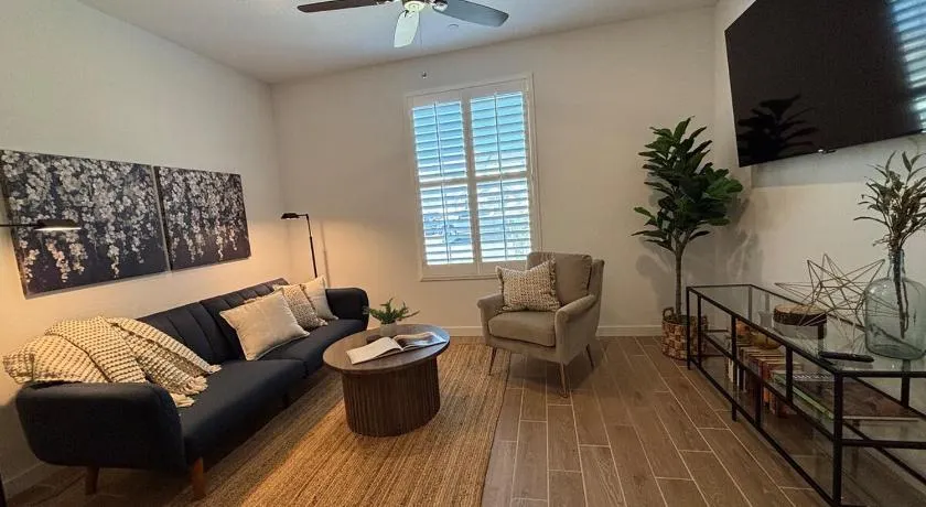 Modern Guest Suite with Living Room and King Bed - Image 1