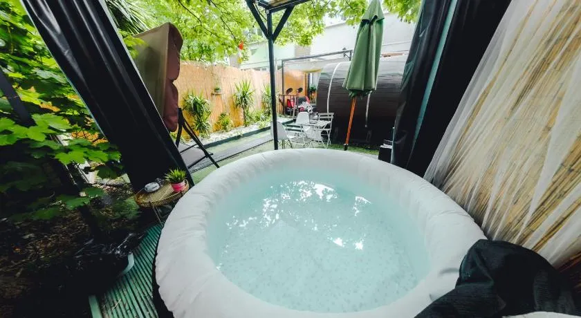 TranquilHaus! 3BR Retreat with Spa Saunas, Hot Tub & Garden Cinema - Image 1