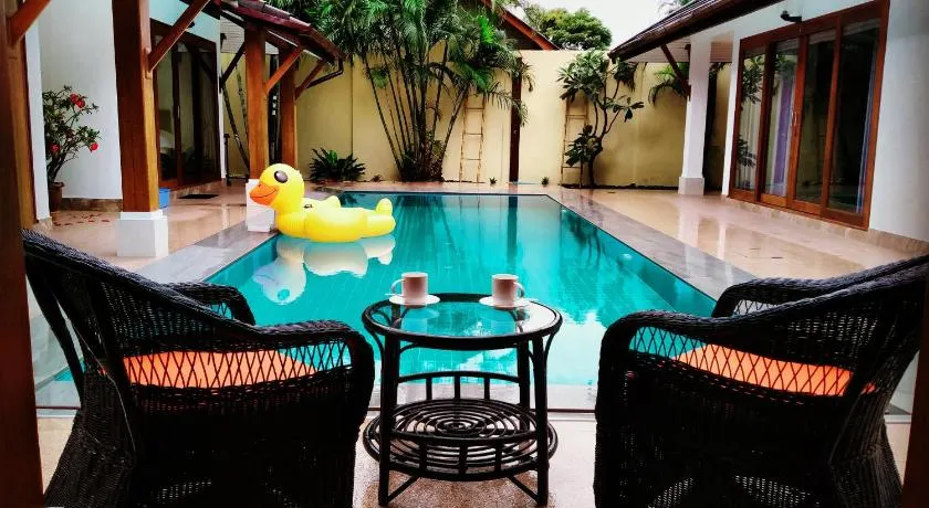 Orange palm pool villa - Image 1