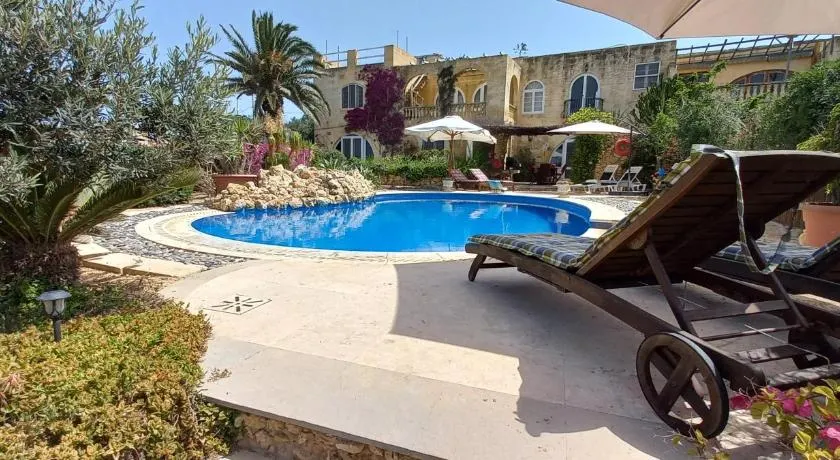 Dar Ta' Xmun - idyllic farmhouse with pool, garden, seaview & sunset - Image 1