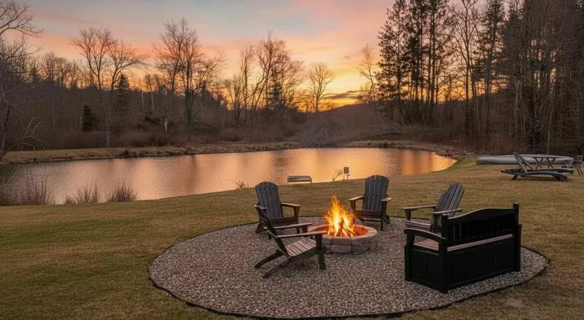 Chic Renovated Chalet with Private Pond - Image 1