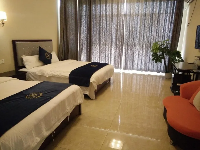 Jiuzhou Business Hotel - Image 1