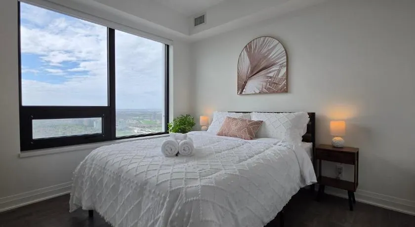 Sky High Luxe Stay 2BR-2BA Near Square One With Lake View, Gym, Pool & Parking - Image 1