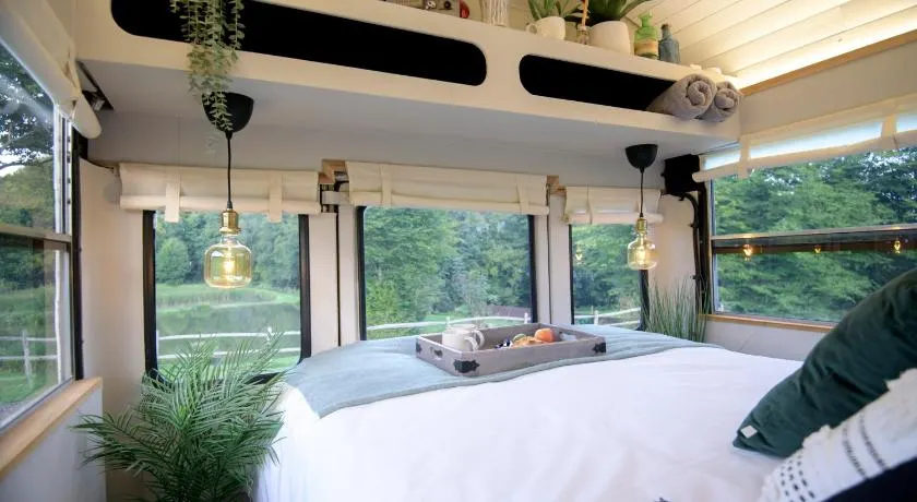 American School Bus Retreat with Hot Tub in Sussex Meadow - Image 1