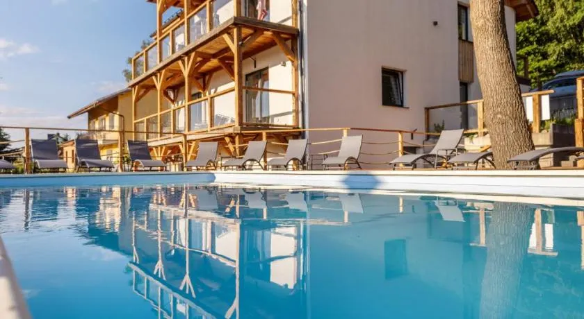 Apartamenty Larice podgrzewany basen, balia i sauna - Image 1