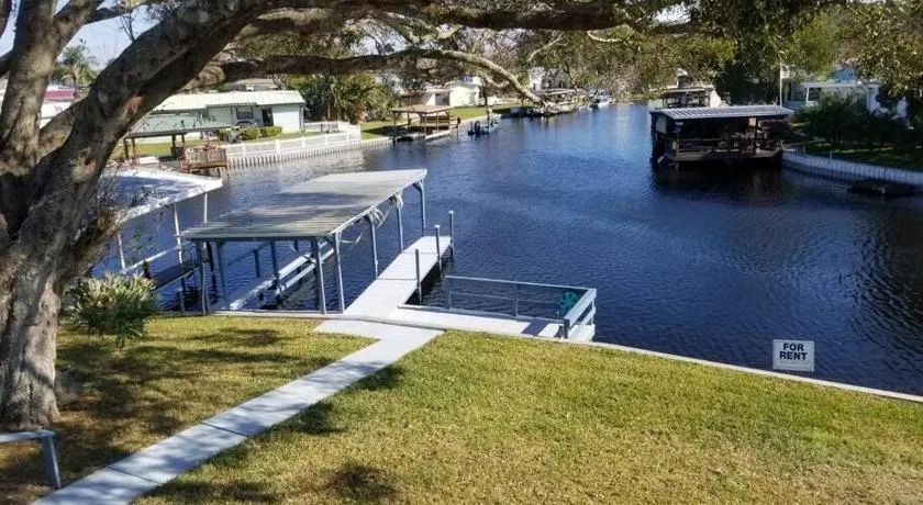 PETS STAY FREE Canal Front 3 bed/2 bath single family ample parking  - Image 1