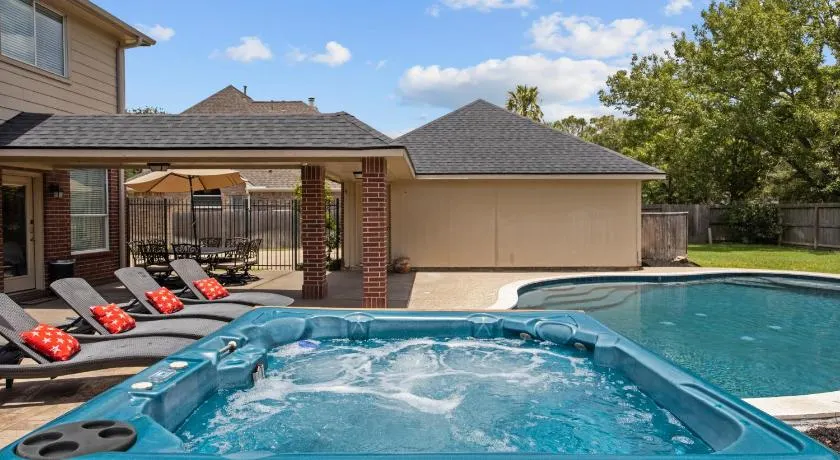 Upscale 4BR Cypress Home w Pool, Hot Tub, Theater, Sleeps 20 - Image 1