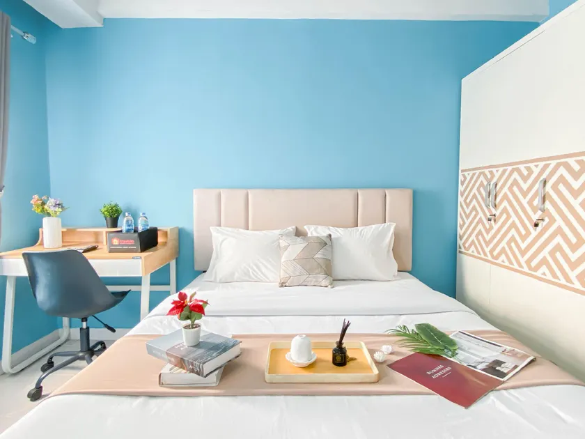 Studio with Blue Tone at Dramaga Tower By Travelio - Image 1