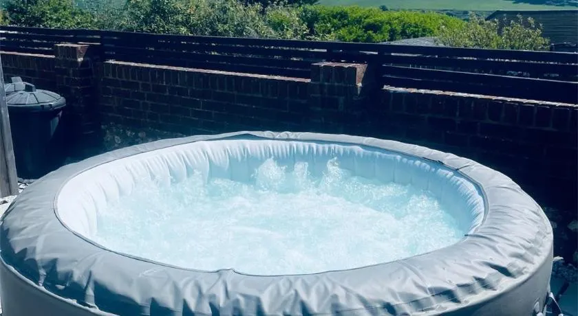 Studio Cabin Retreat with Hot Tub Sea and Downs views in Seaford with own garden - Image 1