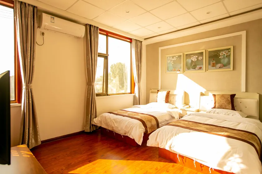 Jushang Business Hotel - Image 1