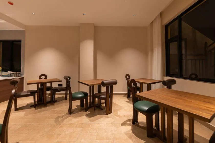 Experience the breathtaking panorama of snow-capped mountains in a luxurious villa. - Image 1