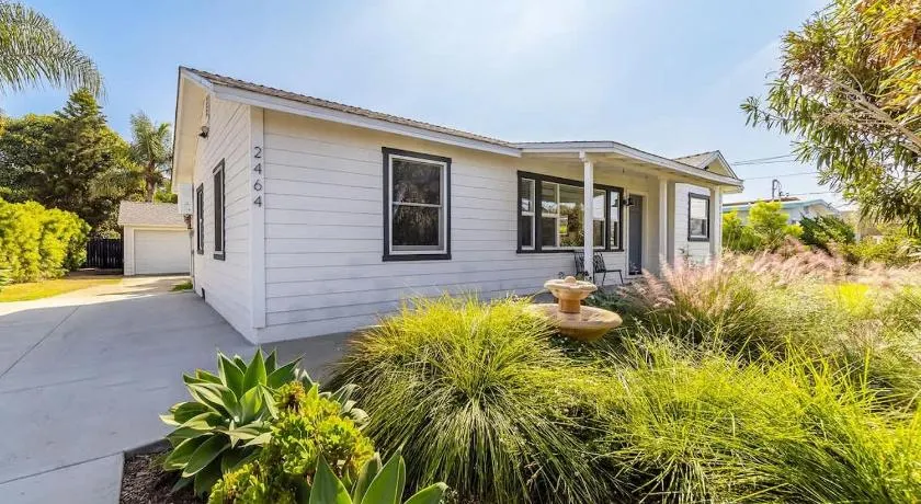 Coastal Palm Haven - With Hot Tub - Image 1