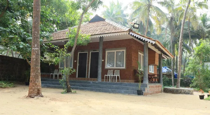 STRIPGREENS BeACH & BACKWATER RESORT VALIYAPARAMBA - Image 1