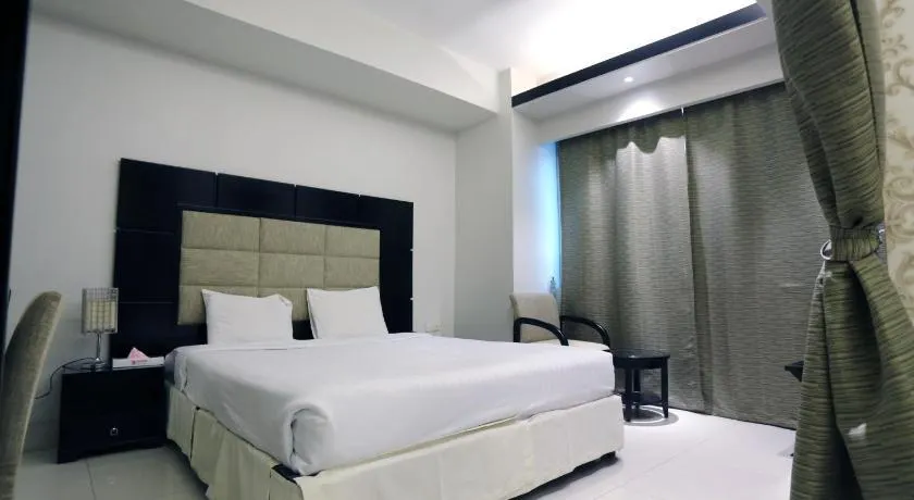 Orchid Business Hotel - Image 1