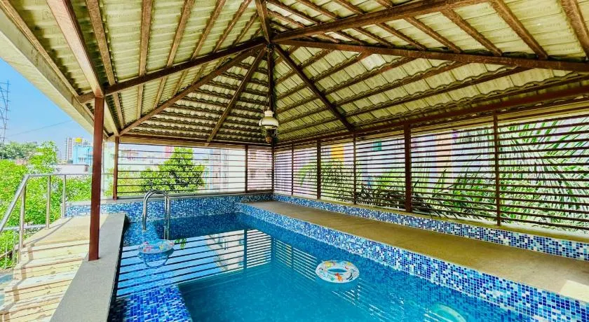Lagoon Luxe 4BHK Luxury Terrace Pool Villa with Private Theatre & Pool Table by Spacez - Image 1