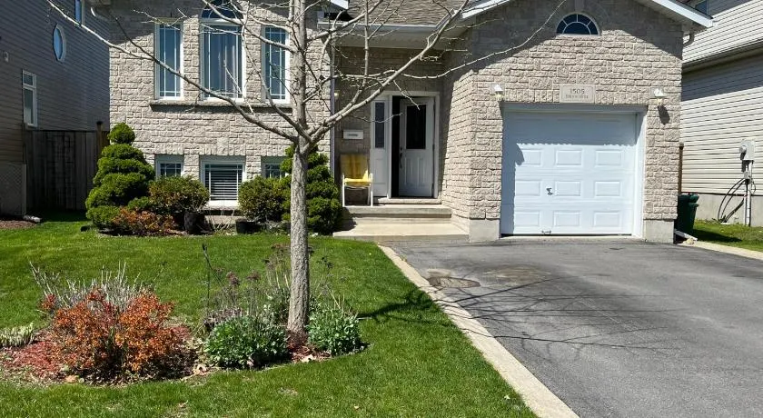 Spacious and Charming Bungalow Retreat (Close to Many Amenities) - Image 1