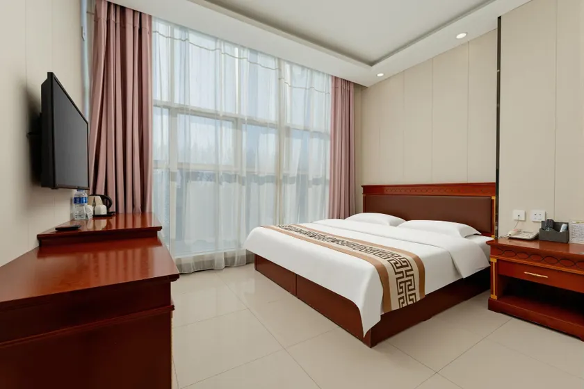 Qiansheng Business Hotel (Guoerluosi Road Branch) - Image 1
