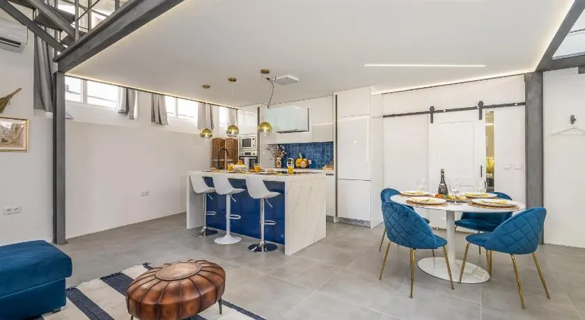 Host Wise - Elegant Loft with Historic Charm & Terrace - Image 1