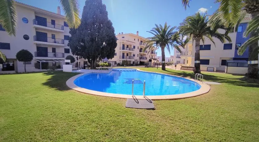 Bajo con terraza, parking y piscina en el centro PORTA MEDITERRANEA ALBERT VILLAS - Image 1