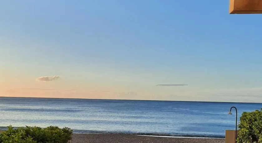 GENIETEN OP HET STRAND - Image 1