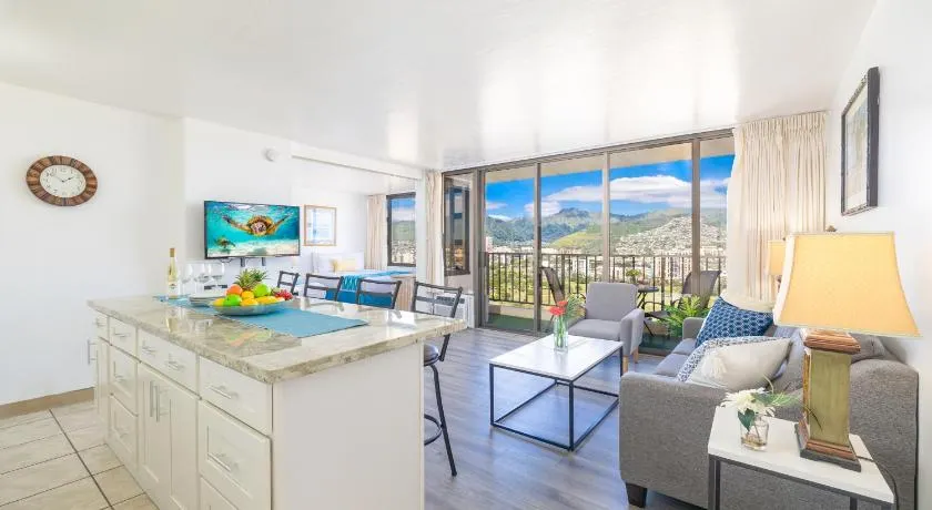 Waikiki Escapade Mountain Views Condo, Steps to Beach with Parking Perk - Image 1