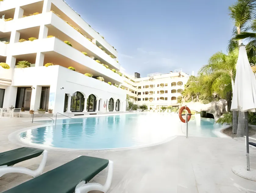 Apartamentos Guadalpin Boutique - Image 1