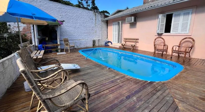 Casa com Piscina, Churrasqueira e Mesa de Bilhar - Image 1