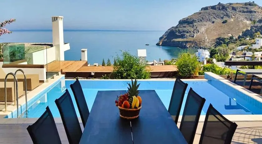 Villa med havsutsikt, kort promenad till stranden, restauranger, barer och 3 km från Lindos! - Image 1
