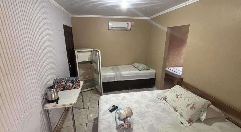 Recanto Pousada JU&JU com piscina COMPARTILHADA - Image 1
