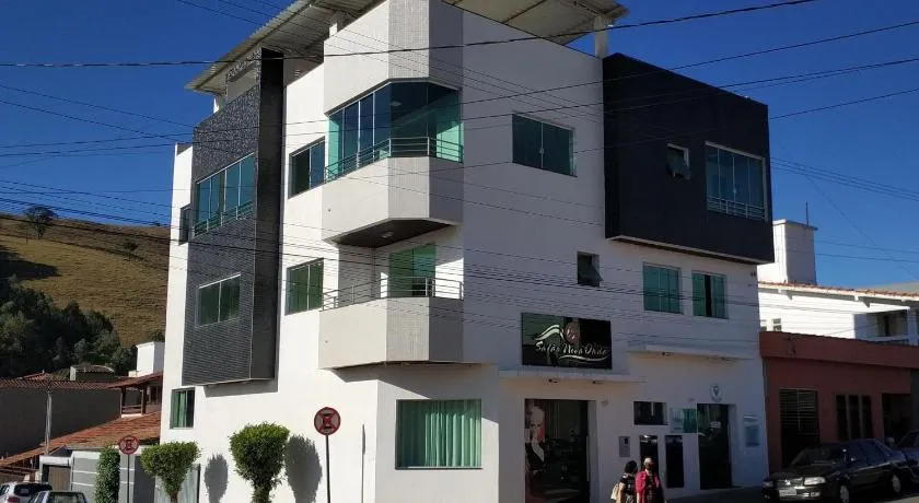 Capitólio Home Suítes - Image 1