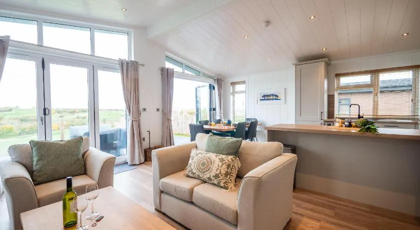 Modern lodge on golf course with spa facilities - Image 1