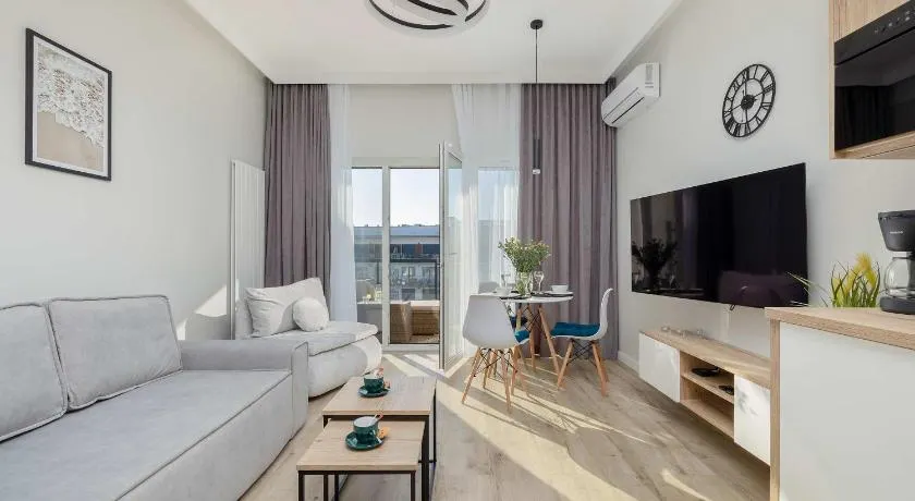 Cozy Studio with River View Spadochroniarzy with Parking & SPA by Noclegi Renters - Image 1