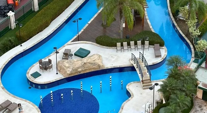 Flat com Vista Panorâmica - Barra da Tijuca - Estacionamento Gratuito - Frigobar - Ar condicionado - Piscina - Academia - Balsa para Praia Grátis - Varanda - Vista Parcial Mar e Lagoa - Image 1