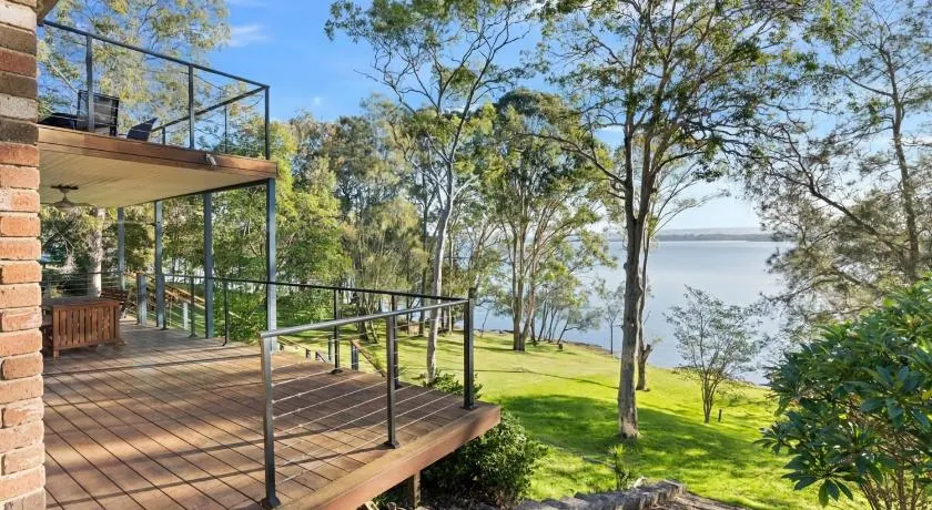 Waterfront Treetops Getaway - Image 1