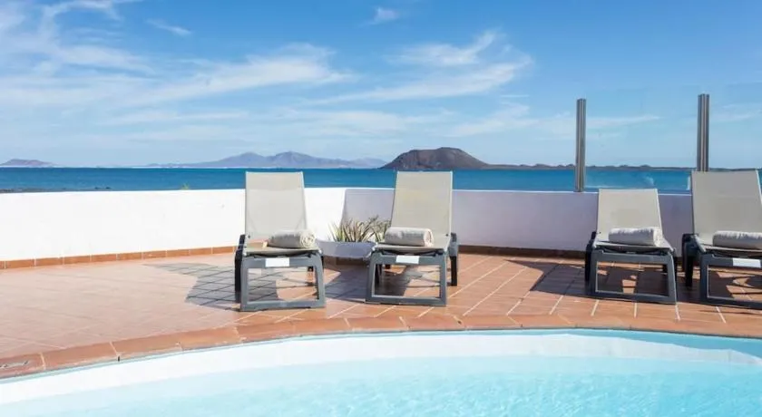 Villa Remos with Beachfront Views Private Heated Pool Fast Wifi BBQ by Amazzzing Travel - Image 1