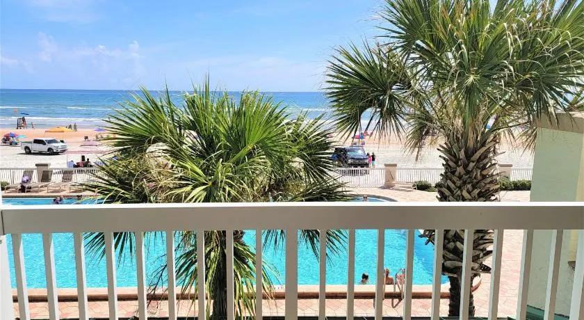 Beachfront Escape with Balcony, Views, and Comfort - Image 1