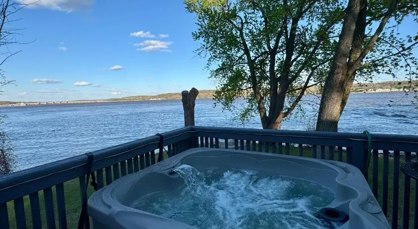 Private Riverfront Escape with Hot Tub, Fire Pit & Wildlife Views - Image 1