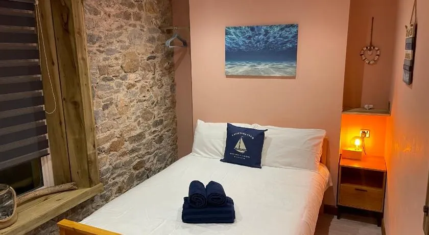 Island Lodge A relaxed Boutique stay tucked into Plymouth historic Barbican combining spacious modern rooms with warm hospitality - Image 1