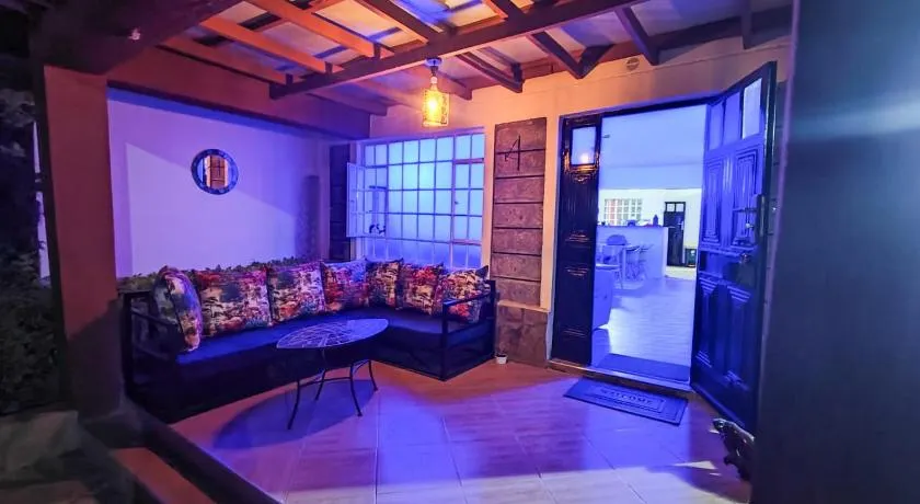 Urban Garden Hideaway Serene one-bedroom retreat with a private garden & chill veranda, 30 Minutes from JKIA - Image 1
