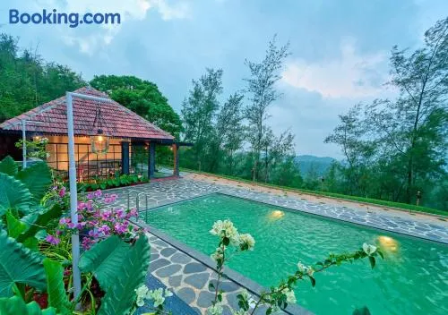 Whispering Hills Pine Malhar Pool & Tent Attappadi by VOYE HOMES - Image 1