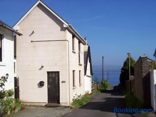 The Snug a cosy, quirky detached cottage with sea views - Image 1